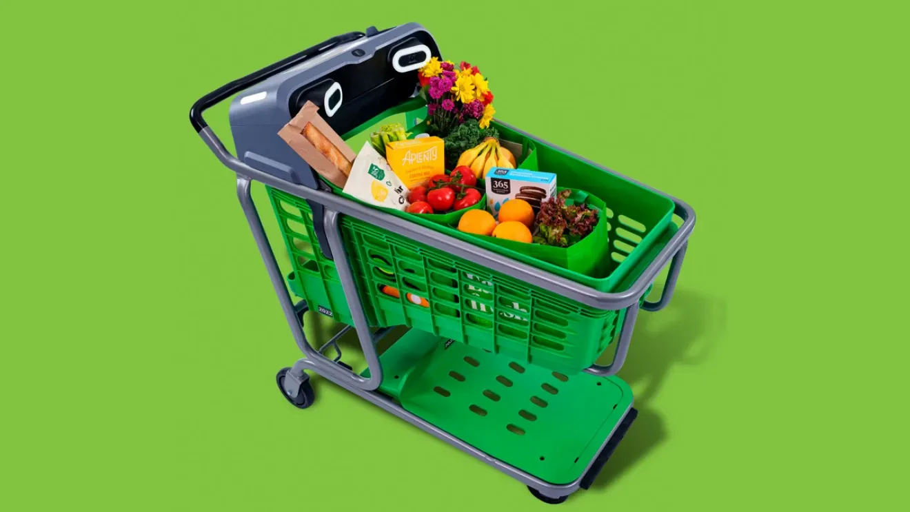 Carrinho de compras digital conectado a produtos e sistemas automatizados de pesquisa e pagamento em uma loja virtual.